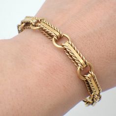 Vintage 14k (.585) yellow gold chain bracelet, made of ornate elongated links alternating with plain round ones. This fabulous bracelet is 7 3/4" long, 9 mm at the widest, weighing 22.9 grams. EA4982 Gold Chain Bracelet, Fine Silver Jewelry, Gold Bracelet Chain, Yellow Gold Chain, Wire Bracelet, Chain Link Bracelet, Fine Silver, Jewelry Ideas, Link Bracelets