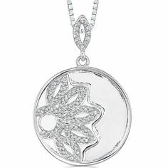 This unique pendant blends classic floral motifs with a contemporary bejeweled setting. It features a round disc intricately engraved and encrusted with 83 dazzling round white diamonds. The smooth edge accentuates the floral pattern and enhances the gem-studded beauty, with a lavish white gold tone giving it a high-end look. The pendant has an oval gem-encrusted bail that gently suspends the medallion on a silver box chain with a secure clasp. Wear this luxurious pendant with trendy turtlenecks or formal outfits for ultimate Hollywood glamour. Main Stone Cubic Zirconia Metal .925 Sterling Silver Rhodium Plated Finish 925 stamp, 3.7 grams Sizing Pendant measures 1.5 x 1 inches Includes A matching tone 18 inch Sterling Silver Box chain with spring-ring clasp A Peora jewelry gift box Birthst Ring Necklace Men, Alexandrite Necklace, Blue Sapphire Bracelet, Peridot Bracelet, Floral Pendant Necklace, Blue Sapphire Necklace, Wedding Anniversary Rings, Amber Bracelet, Formal Outfits