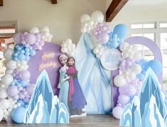 a frozen princess themed birthday party with balloons