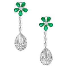 Elevate your style with our exquisite Pear Shaped Emerald Earring Set in a stunning flower shape design. Crafted in white gold and adorned with sparkling pave diamonds, these earrings will add a touch of glamour to any look. Perfect for special occasions or everyday wear, this set is a must-have for any jewelry collection. 18KT:13.35g; Diamond:2.14ct, Emerald:5.85ct," Emerald Earring, Indian Jewellery Design Earrings, Indian Jewellery Design, Jewelry Design Earrings, Jewellery Ideas, Emerald Earrings, Indian Jewellery, Shape Design, Flower Shape