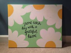 a painting with words written on it and daisies