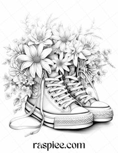 a pair of sneakers with flowers in them