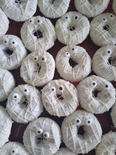 there are many donuts made to look like faces and eyes with holes in them