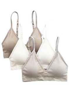 Description:The Gia bralette is so comfy and flattering! Seamless ribbed bralette deep V-neck silhouette. With thin adjustable shoulder straps, pullover style, and removable padding. Material:88% Nylon, 12% Spandex*Bralette Deal* Buy any 3 of our Miley, Gia, Jai, Sunrise, Gracie, Hannah and Hannah Plus bralettes and get them 3 for $35! Mix-n-Match styles and colors. Must enter Promo Code 3for35 at checkout. Affordable Boutique Clothing, Athleisure Tops, Padded Bralette, Seamless Bra, Grey And Beige, Padded Bras, Affordable Clothes, Scarf Hairstyles, Cross Straps