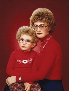 an older woman and young child wearing glasses