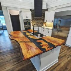 a kitchen counter made out of wood with black and white lines on it's edge