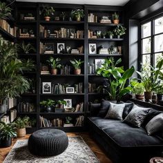 a living room with lots of plants and bookshelves on the shelves in it