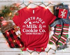 North Pole Milk & Cookie Co Reindeer Shirt, Cooking Shirt, Baking Shirt, Christmas Shirt,  North Pole Shirt, Christmas Sweatshirt, Holiday T, Christmas Crew Shirt, Family Christmas Shirt, Family Christmas Shirts, Christmas T Shirt, Toddler Christmas Shirt, Holiday Shirt * High quality and super soft, comfortable shirt. Made with top-of-the-line vinyl and pressed with a professional grade heat press. * Please check all color and size charts before place the order. Since all shirts are custom made Christmas Gift Baking, Cooking Shirt, Toddler Christmas Shirt, Christmas Family Shirt, Reindeer Shirt, Holiday Sweatshirt, Toddler Christmas, Funny Christmas Shirts, Family Christmas Shirts