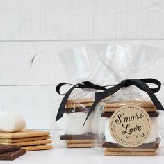 some cookies and marshmallows are sitting on a table