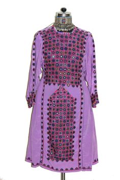 "Item Description Vintage Collection Baluchi Dress Truly amazing gypsy and bohemian vintage authentic Afghanistan treasure. This unique garment is made from vintage textiles hand crafted in Afghanistan. This dress is from Afghanistan and artistically created from vintage pieced fabric. It is all hand made and hand brought from India & pakisthan border ariya . It has a loose silhouette that falls in length to the knee. This garment is a stellar example of the amazing textiles that influence fashi