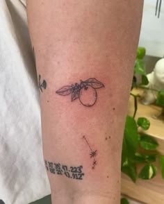 a person with a small tattoo on their leg