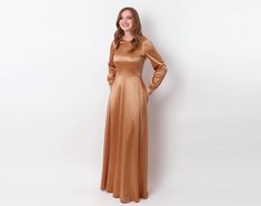 Gold dress with belt, bridesmaid dress, wedding guest dress, long ball gown, full length dress, custom lengths dress, evening dress, wedding cocktail party dress, party dress, cocktail dress You can find the pictures of ALL OTHER COLORS in our catalog on ETSY here: https://www.etsy.com/shop/ENMEstyle?ref=seller-platform-mcnav§ion_id=35708129 Model's height is 5'9" (175 cm) / Size US 6 / M ADJUSTMENTS  We can make any length adjustments special for you and for free! The sizing forgives plus-minus Luxury Full-length Bridesmaid Evening Dress, Luxury Full Length Bridesmaid Dresses, Luxury Belted Evening Dress, Luxury Full-length Stretch Gown, Golden Bridesmaid Dresses Long Sleeved, Luxury Stretch Full-length Evening Dress, Luxury Full Length Green Gown, Satin Dress With Belt, Dresses Wedding Guest