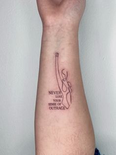 a woman's arm with a tattoo saying never give up your strength and courage