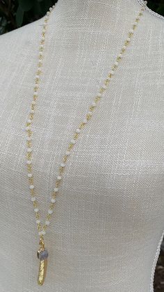 "Pretty white crystal beaded rosary necklace with a gold filled leaf charm and gray druzy charm. Approximately 31\" long. Beautiful along or layered with other necklaces." Pyrite Jewelry, Rosary Chain Necklace, White Beaded Necklace, Beaded Rosary, White Beaded Necklaces, Gold Mermaid, Mermaid Jewelry, Feather Necklace, Druzy Necklace