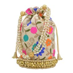 a purse with pearls and flowers on it