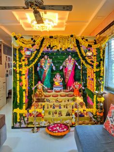 a mandap decorated with flowers and garlands