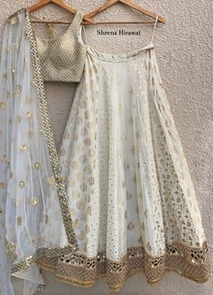 White and Gold Threadwork Blouse With Ivory Kali Lehenga And Net Dupatta Shrena Hirawat - Fabilicious Fashion Threadwork Blouse, Kali Lehenga, Lehenga Simple, Mirror Work Border, Sheer Dupatta, Gold Lehenga, White Lehenga, Indian Outfits Lehenga, Lehnga Dress