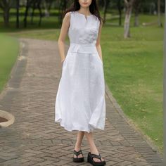 Keep it fresh and fashionable this summer with our Linen Midi Dress. This sleeveless, split neck white dress, perfectly designed for those hot summer days, ensures you stay comfortable while looking chic.  ★★FEATURES 100% Linen Two side pockets White cotton lining Split V neck dress Right hidden zipper Sleeveless Linen dress Linen midi dress Below knee length Minimalist Dress Perfect for summer,spring Other more color selection ★★ Bespoke Order Service If you Request other color Request the leng Sleeveless Linen Dress In Solid Color, Sleeveless Solid Color Linen Dress, White V-neck Sleeveless Dress For Summer, White A-line Sleeveless Dress For Summer, Solid Color Midi Length Sleeveless Summer Dress, Summer Sleeveless Midi Dress In Solid Color, Solid Color Midi Length Summer Dress, White Sleeveless Casual Dress, Casual White Sleeveless Dress