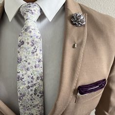 Handmade with 100% imported cotton fabric. Perfect for work, weddings or a night out on the town. This Floral Lavender Tahiti Tie will make you feel like the gentleman you aspire to be or accentuate the gentleman you already are. You’ll look good, feel good and do good things in this tie. Makes the perfect gift for a fellow gentleman or for that man in your life by making them look good and feel good. We guarantee your satisfaction with our free refund policy.* Goes Good With: Navy, Tan, Beige, Elegant Cotton Suit And Tie Accessories For Wedding, Summer Formal Cotton Suit Accessories, Elegant Cotton Suit And Tie Accessories For Summer, Formal Cotton Suit And Tie Accessories For Summer, Spring Business Cotton Suit And Tie Accessories, Dapper Cotton Suit And Tie Accessories For Formal Occasions, White Cotton Suit And Tie Accessories For Formal Occasions, Purple Fitted Suit And Tie Accessories For Groom, Formal Lavender Fitted Suit And Tie Accessories