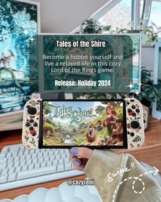 someone holding up a nintendo wii game controller in front of a computer screen with the title tales of the shire