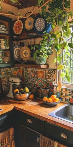 a kitchen counter topped with lots of plates and bowls