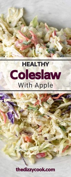 coleslaw with apples and carrots in a white bowl on top of a table