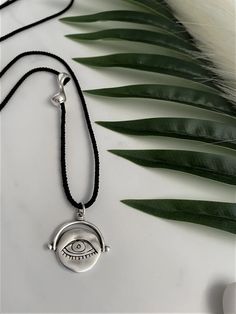 Black Cord Evil Eye Charm Necklace Long Black Rope | Etsy Greece Black Bohemian Jewelry With Evil Eye, Black Bohemian Evil Eye Jewelry, Adjustable Silver Evil Eye Necklace, Adjustable Sterling Silver Evil Eye Necklace, Black Sterling Silver Jewelry With Adjustable Cord, Black Sterling Silver Jewelry With Adjustable Length, Silver Evil Eye Charm Necklace For Good Luck, Silver Charm Necklace With Evil Eye For Good Luck, Black Sterling Silver Necklace With Adjustable Cord