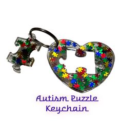 Handmade Autism Awareness Puzzle Piece Key Chain.  Made from durable acrylic featuring a detached puzzle piece and rainbow embedded puzzle pieces. White Hall, Puzzle Piece, Puzzle Pieces, Key Chain, Keychains, Rainbow, Key, Chain, White