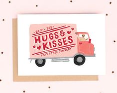 a valentine card with the words hugs and kisses written in red on top of a pink truck