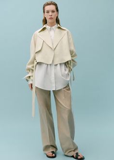 100% linen cropped trench coat - Women | Mango USA Modern Linen Outerwear With Lapel Collar, Elegant Collared Cropped Jacket For Spring, Beige Linen Collared Outerwear, Modern Linen Outerwear For Fall, Chic Cropped Jacket With Lapel Collar For Spring, Elegant Linen Outerwear For Daywear, Chic Office Cropped Jacket With Collar, Chic Linen Outerwear For Work, Beige Linen Outerwear For Work