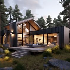 a modern house in the woods with stairs leading up to it's patio area