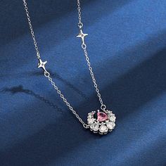 Description:Heart Moon Phase Necklace Specifications:Material: Copper, Cubic Zirconia, Crystal, SilverChain Colors: SilverSize: 40 cm + 5 cm extWeight: 3.8 g/pcs Unlock your inner love goddess with the Heart Moon Phase Necklace. This unique necklace features a lunar-inspired design that will add a touch of magic to any outfit. Wear it as a reminder to embrace the phases of love and life. Love, laugh, and let your heart shine (like the moon)! Crystal Heart Necklace With Clavicle Chain For Weddings, Crystal Pendant Necklace As Gift For Her, Pink Crystal Necklaces For Mother's Day, Pink Crystal Necklace For Mother's Day, Mother's Day Pink Crystal Necklace, Celestial Cubic Zirconia Pendant Necklace, Moon Charm Pendant Necklace For Wedding, Crystal Clavicle Chain Necklaces For Mother's Day, Pink Cubic Zirconia Flower Pendant Necklace