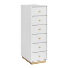 a white cabinet with five drawers and gold handles