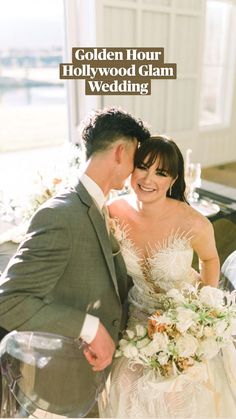 a bride and groom standing next to each other in front of a dining room table