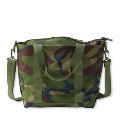 Ideal for waterfowling, dog training or just trekking around town, this camouflage zip-top tote stands up to rugged use in the field while keeping your belongings protected and dry. It's been updated with a convenient shoulder strap. Made from a tough 1,200-denier polyester shell. Thermoplastic interior coating is both durable and water resistant to keep your gear dry. Overlapped seams double-stitched with nylon won't rot or break. Adjustable carry shoulder strap made from rugged nylon webbing c