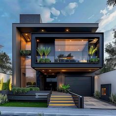 a modern house with stairs leading up to the front door and landscaping on both sides