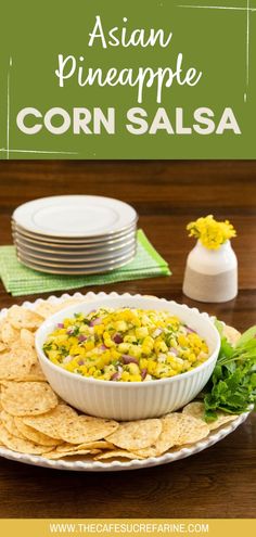 a plate with corn salsa and tortilla chips