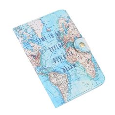 a passport case with a world map on the front, and a button in the middle