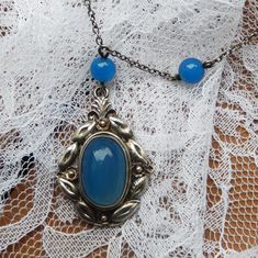 The translucent sky-blue chalcedony stones in the necklace are gorgeous. Made in around 1920 and marked "SILVER" to the reverse. The central stone is framed by hand wrought leaves and flowers. I don't know who the maker is but I'm guessing it's likely from England. The pendant feature measures approximately 35mm x 25mm  17.5" / 44cm long In excellent condition Chalcedony Stone, Blue Chalcedony, Antique Art, Favorite Jewelry, Silver Necklace, Jewelry Necklaces, Arts And Crafts, Gift Card, Etsy Accessories