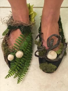 two pairs of shoes with plants on them