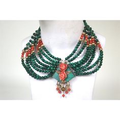 This is part of Chairish’s Fine Jewelry assortment.  Perfect for a Socialite from a Palm Beach Socialite Collection!   Turn heads in this enchanting colorful vintage victorian collar necklace. Stunning combination of green malachite, coral beads, 14-karat beads, 14 K.slide clasp- featuring a pair of carved coral roses surrounded by carved gold articulated leaves upon a diamond shaped slab of malachite with gold and coral hanging beads.finest 14 K. gold nicely articulated designer slide clasp that locks in, also has a safety closure.  Stamped on the clasp 14-karat.---8 in. end to end wide collar--x 7 1/2 in. back to front  Elegant stylish necklace worn by a stylish Palm Beach Socialite!  Please reference the measurements noted in the description above for the best approximate dimensions. Pl Ceremonial Green Gemstone Necklace, Traditional Handmade Emerald Necklace, Traditional Handmade Emerald Necklaces, Unique Green Jewelry For Ceremonial Occasions, Handmade Victorian Green Necklaces, Ceremonial Green Beaded Jewelry, Green Beaded Jewelry For Ceremonial Occasions, Handmade Traditional Malachite Jewelry, Traditional Handmade Malachite Jewelry