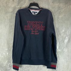 Tommy Hilfiger Men's Navy Crewneck Slater Embroidered Tufted Chenille Logo Patch Sweatshirt Sz L Embroidered Tufted Chenille Logo Appliqu At Front; Contrast-Stripe Ribbed-Knit Cuffs; Ribbed-Knit Hem Ribbed-Knit Crewneck Imported 100% Cotton Machine Washable This Is A New With Tags/Box Item. Please Refer To Images. Approx. Measurements: (Hung) * Length: 27" * Chest: 25" * Sleeves: 23" Retail Price: $- Casual Tommy Hilfiger Tops With Embroidered Logo, Tommy Hilfiger Long Sleeve Logo Sweatshirt, Tommy Hilfiger Logo Print Long Sleeve Sweatshirt, Patch Sweatshirt, Navy Crewneck, Tommy Hilfiger Sweatshirt, Tommy Hilfiger Shirts, Tommy Hilfiger Man, Mens Navy