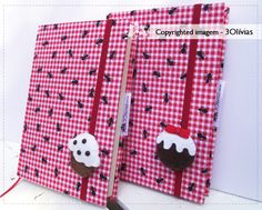 two red and white checkered paper with cupcakes on them next to a pair of scissors