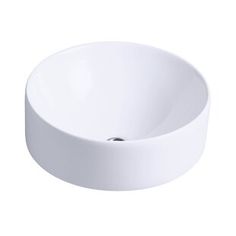 a white bowl sink sitting on top of a counter