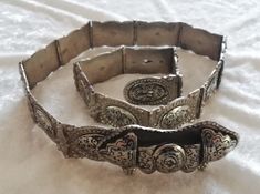 Mid Century, Ottoman style Turkish niello belt consisting of  buckle and 17 links. Bridal belt adjustable for three sizes (#4). *         84cm (33") in general length    buckle 9cm by 4cm (3.1/2" by 1.1/2") Solid and in very good condition for age with some wear of use. (see all picts as complementary information to the item description) Collectable Hand crafted Mid Century Ottoman, Brass Belt, Ottoman Styling, Bridal Belt, Suspender Belt, Ottoman, Hand Crafted, Etsy Accessories, Accessory Gift