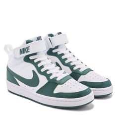 He'll love the retro-stylish look of the Kids' Nike Court Borough 2 High Top Sneaker. Leather upper in a casual mid top sneaker style with a round toe. Lace up closure. Heel pull loop. Padded collar. Nike Swoosh and logo details. Smooth lining cushioning insole. Durable rubber outsole. Collar Nike, Nike Shoes Women Fashion, Nike Court Borough, Mid Top Sneakers, Sneaker Style, High Top Sneaker, Mid Top, Nike Swoosh, Nike Kids