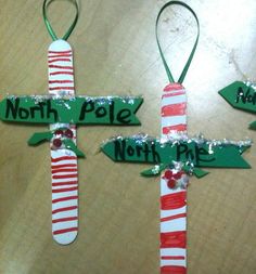 three christmas decorations made to look like toothbrushes with the names north pole, north pole and north pole on them