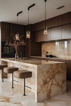 a kitchen with marble counter tops and stools