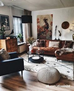 a living room filled with furniture and decor