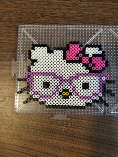 a plastic case with a hello kitty design on it